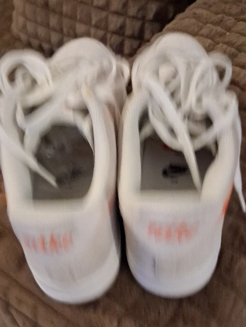 Nike White and Beige Low-Top Sneakers with Black Swoosh